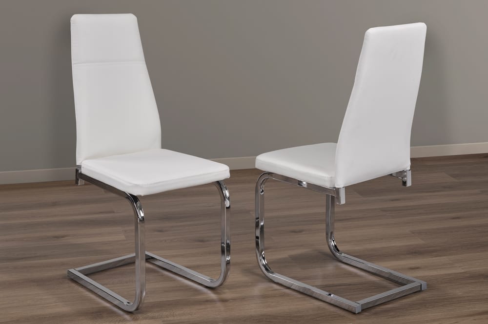 Set of 2 white leatherette dining chairs with chrome wrap-around legs