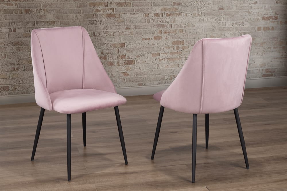 Pink velvet dining chair with cushioned seat and back