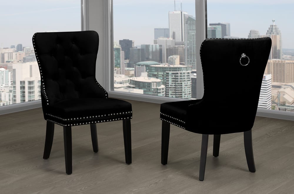 Velvet dining chair with button tufting, nail-head trim, and chrome knocker – Black