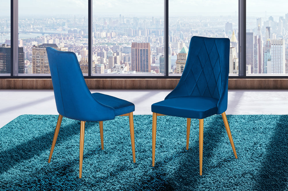 Set of 2 blue velvet dining chairs with gold legs and cushioned back